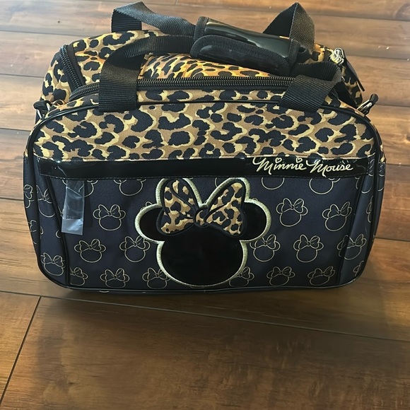 Disney Handbags - Disney Minnie Mouse carry one travel luggage bag leopard print
